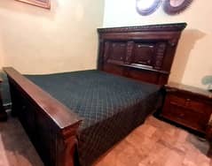 solid chinoti wood bed with side tables