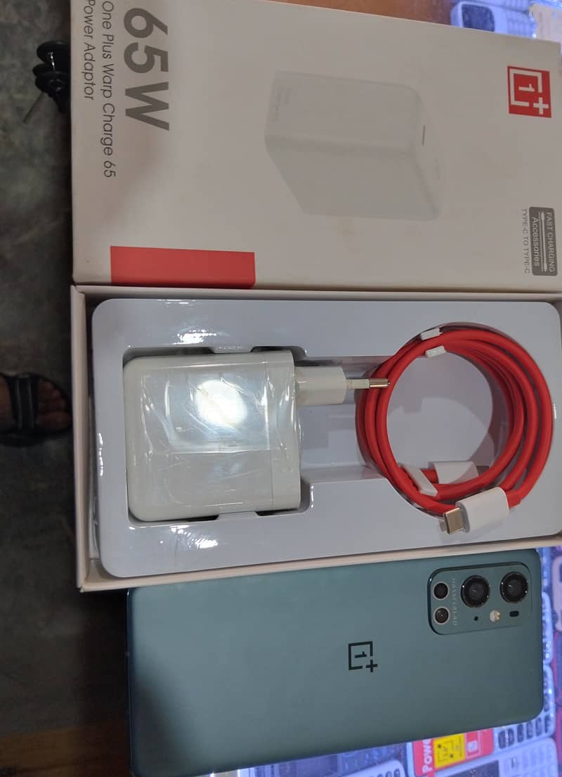 One plus 9 pro 12 256 brand new with 65 watt charger 0