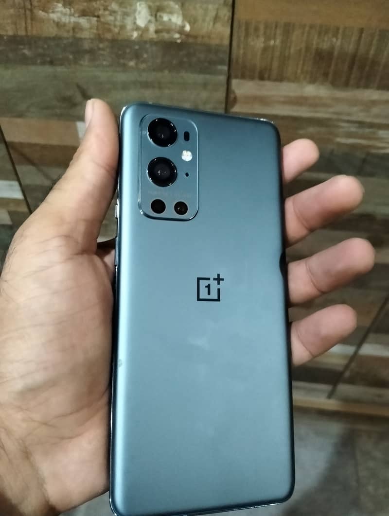 One plus 9 pro 12 256 brand new with 65 watt charger 1