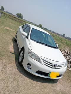 Toyota Corolla XLI Modal 2014 white colour