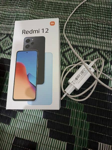 Redmi 12 . . 8+128 new mobile slightly use 3