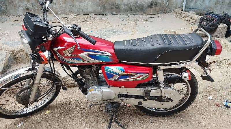 honda 125 karachi number  model 2021 and reg 2022 0