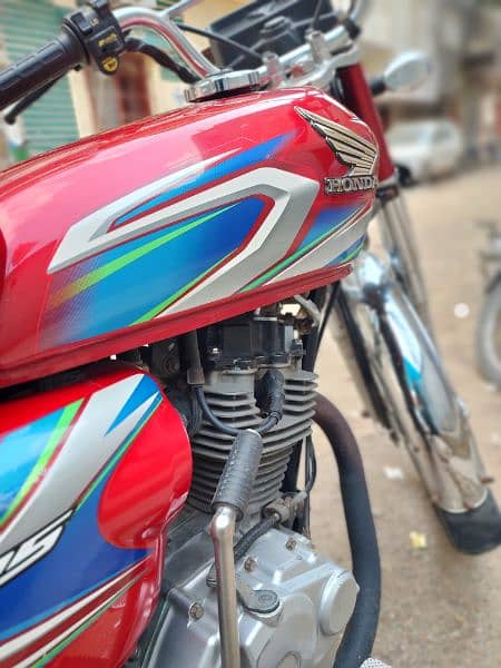 honda 125 karachi number  model 2021 and reg 2022 1