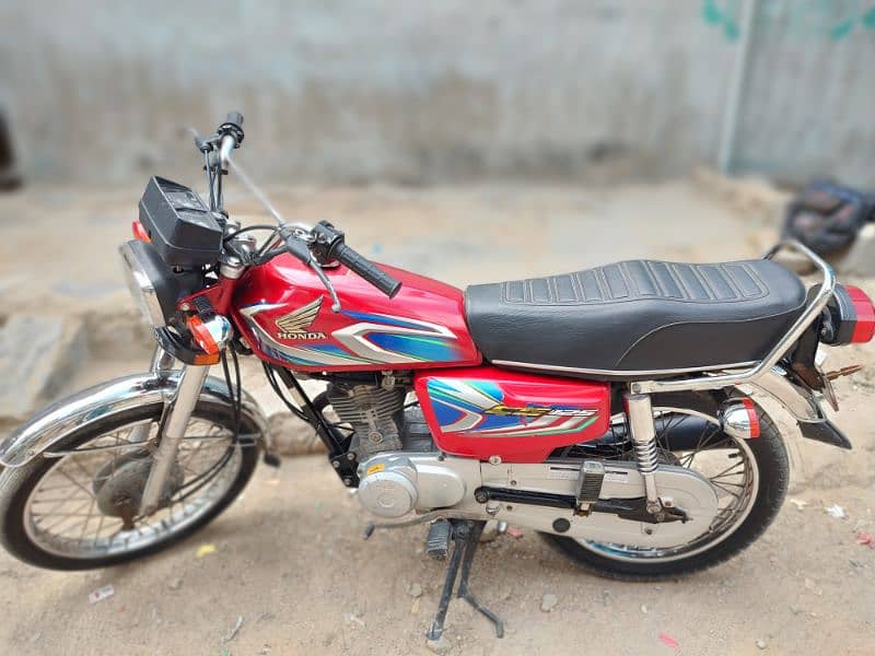 honda 125 karachi number  model 2021 and reg 2022 2