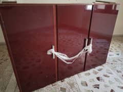 Red color hand made cupboard for storage use