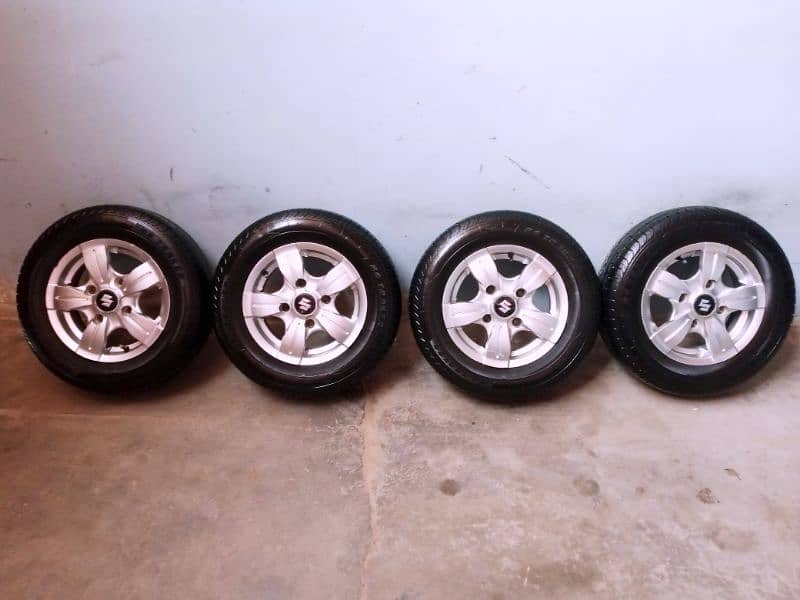 new japani alloy rims with new tyres size "12" 1