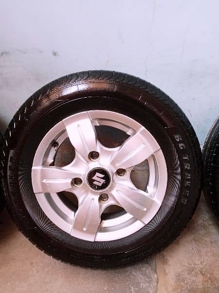 new japani alloy rims with new tyres size "12" 2