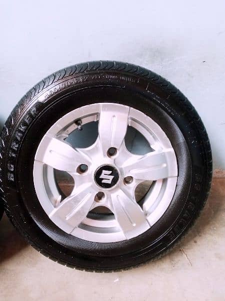 new japani alloy rims with new tyres size "12" 3