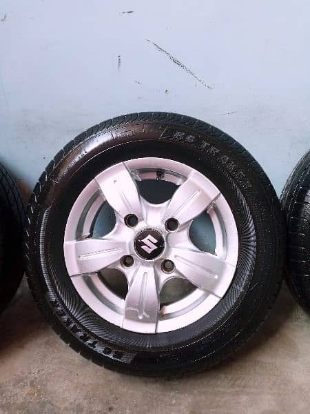 new japani alloy rims with new tyres size "12" 4