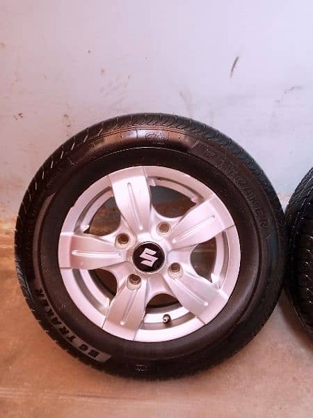 new japani alloy rims with new tyres size "12" 5