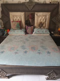 bed with side table and dressing