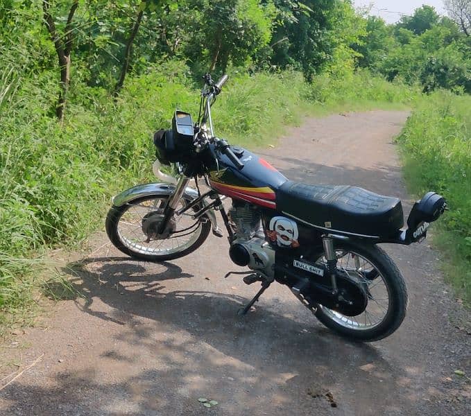 Honda 125 bracket,mask, straight pipe 1