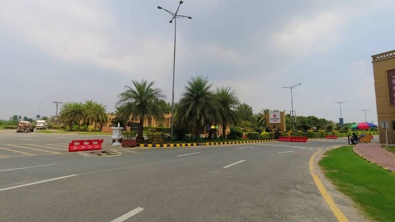 20 Marla Plot New Lahore City 80ft Road Main Buleward Near Play Ground & Attached Bahria Town All Deus Clear Possession Paid 2