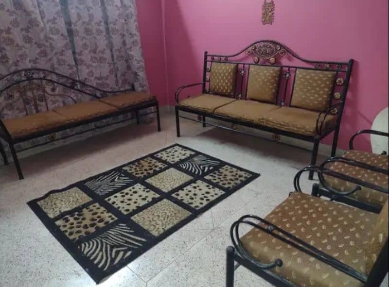 8seater iron sofa set with pot and 1wood sofa 2seater. read description 1