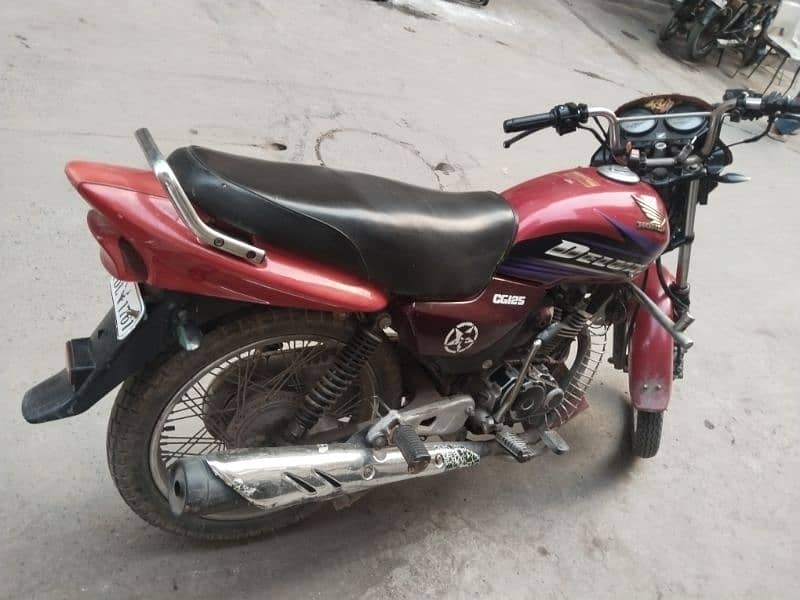 Honda 125 deluxe 10 by 10 condition 3