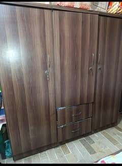 single bed and 3 door almari