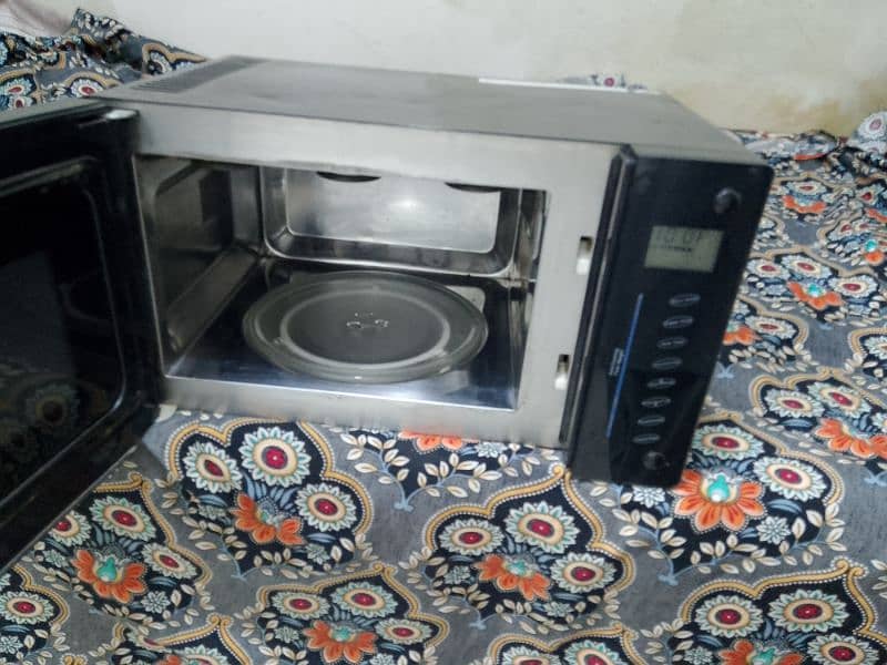 3 in 1 microwave oven grill or baking bhi hote h garmani ka touch wala 0