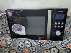 Haier microwave oven 2 in 1 h grill bhi Hote h garam Bhi large size