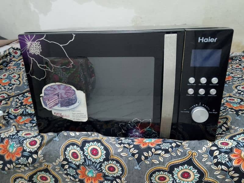 Haier microwave oven 2 in 1 h grill bhi Hote h garam Bhi large size 0