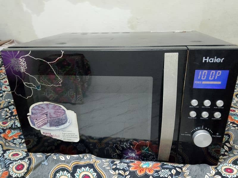 Haier microwave oven 2 in 1 h grill bhi Hote h garam Bhi large size 1