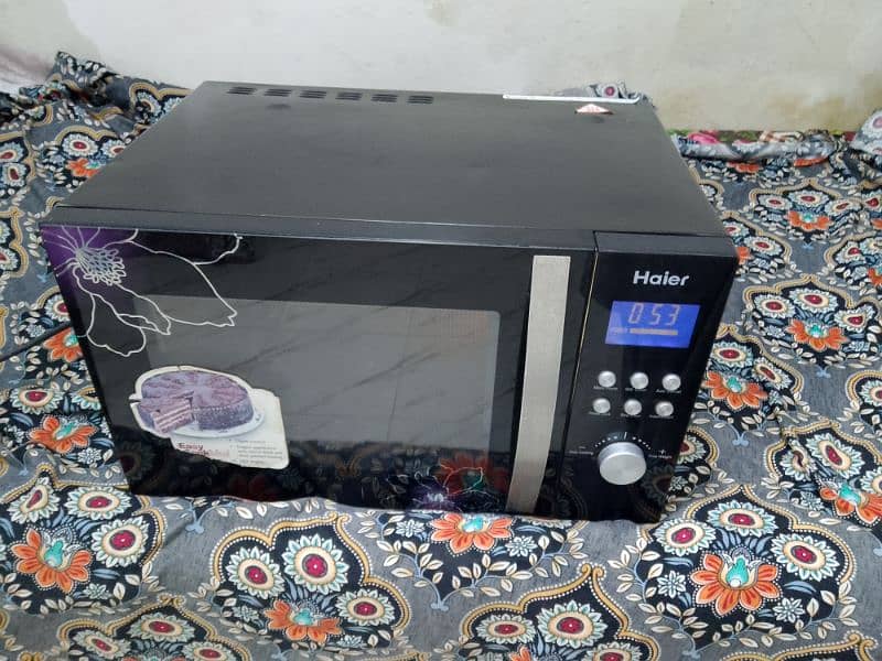 Haier microwave oven 2 in 1 h grill bhi Hote h garam Bhi large size 5