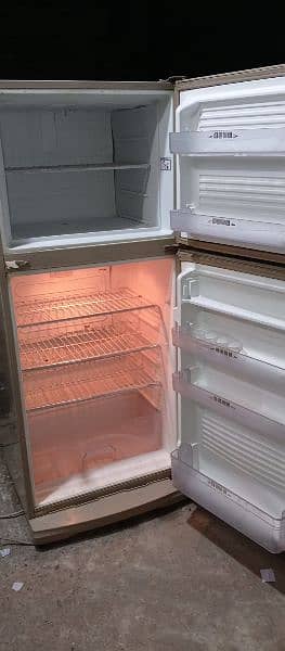 fridge medium size best cooling Dawlance Gujranwala Kashmir road 1