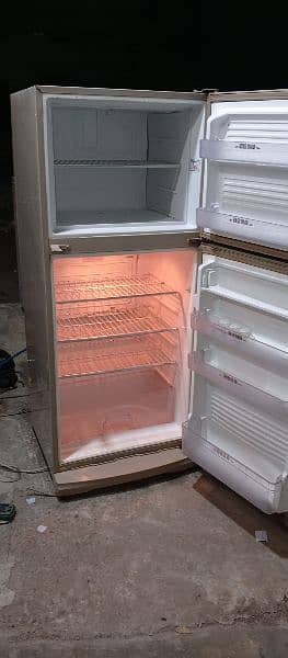 fridge medium size best cooling Dawlance Gujranwala Kashmir road 2