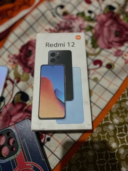 Redmi 12    8/128  with box  and charger 1