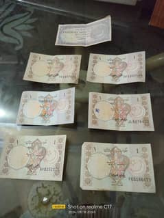 6 old Pakistani 1 rupees note and a old 2 rupees note