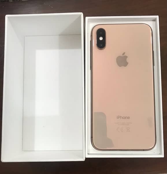 iPhone Xs,Gold ,64 Gb 0