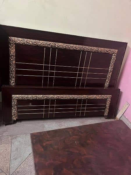 bed full new all ok only 2 days used and two set table 0