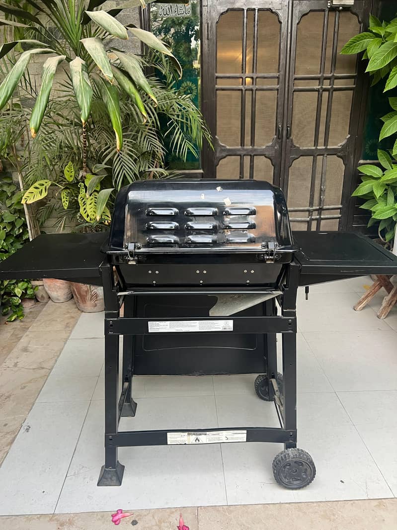 Gas Barbque Grill with 01 burner. Make# Char-Broil American. 3