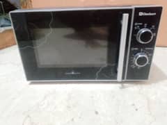 1 year use 20 litar dawlenc microwave original condition me hai