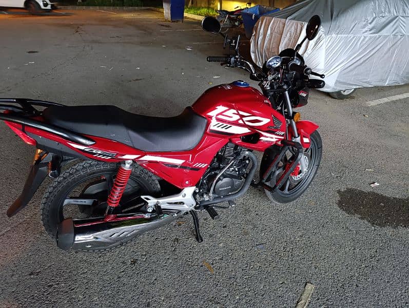 Honda CB150F 2024 - Rare Red Color with Advanced Security & Free Servi 3