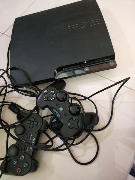 ps3 for sell with 12 cds 1