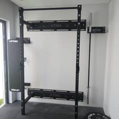 Fold away back power rack || j cups || flat bench || holder, barbell