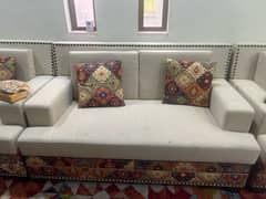 2 seater branded sofa in beige and in a unique border 0