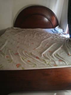 Queen size wooden bed with mattress