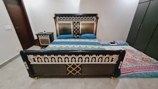 wooden kingsize bedset with 2 side tables and dressing table