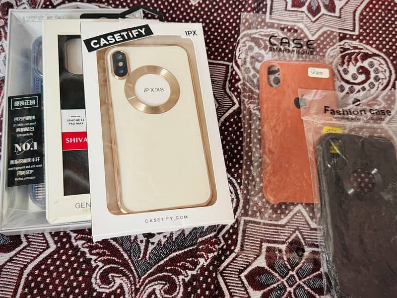 Iphone 14 pro max 2 cover 1 leather cover and 3 Iphone x/xs covers. 9