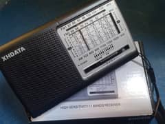 xhdata D-219 Full band Radio in box packed condition.