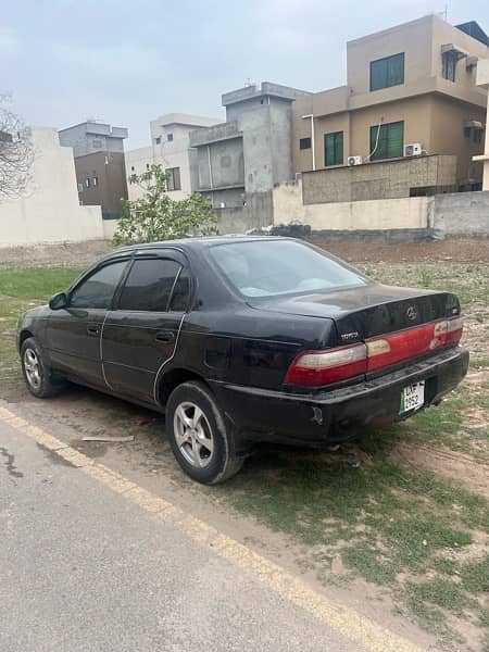 Toyota Corolla XE 1998 betr than mehran alto cultus santro 1