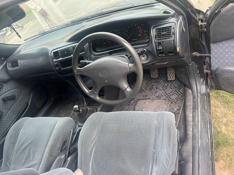 Toyota Corolla XE 1998 betr than mehran alto cultus santro 2