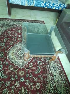 A classic table with glass cover