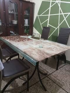 Dining table with 6 chairs. . . urgent sale