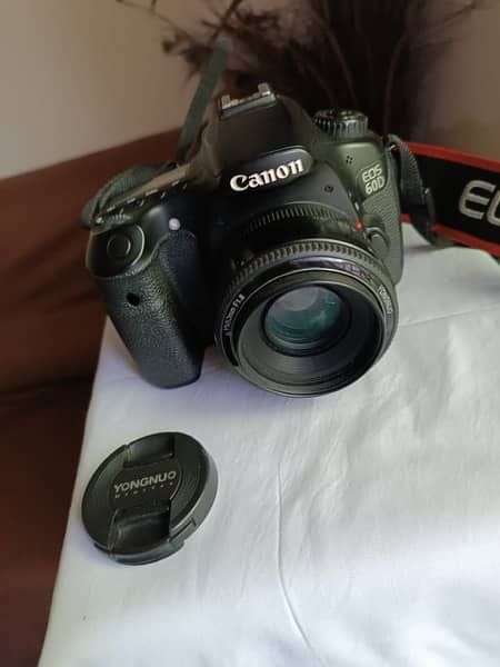 CANON 60D Condition 10/10 with 50MM Yogno Lense 6