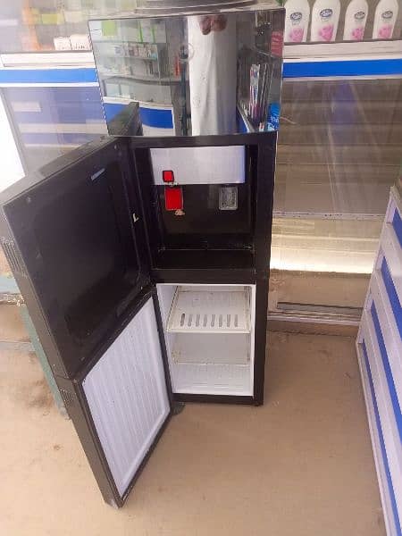 pel water dispenser in working condition both hot and cold and refrig 1