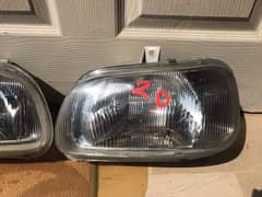 Coure/Mira Geninue Head Lights 0