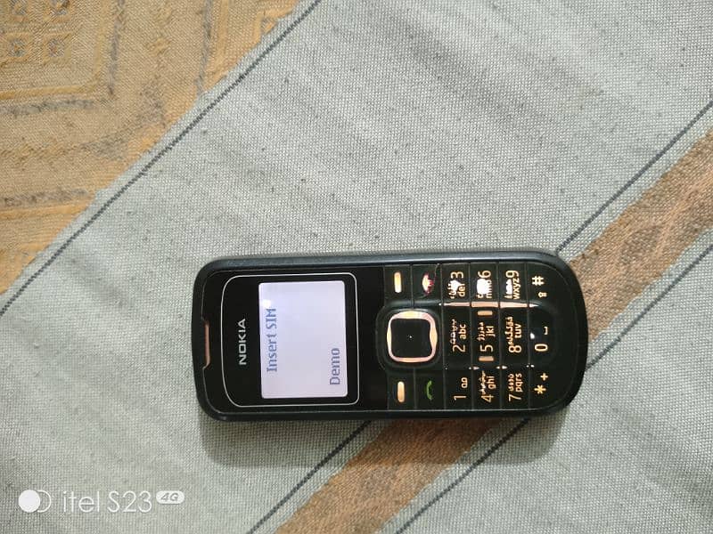 Nokia 1202 With original cassing nd keyboard. AR new original battery. 0