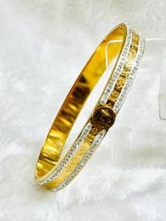 Gold plated kara.